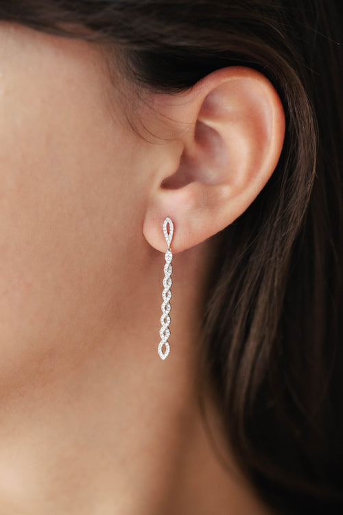 Boucles d'oreilles en or blanc et diamants