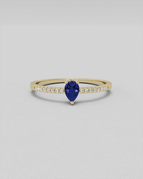 Bague en or blanc sertie de diamants et saphir