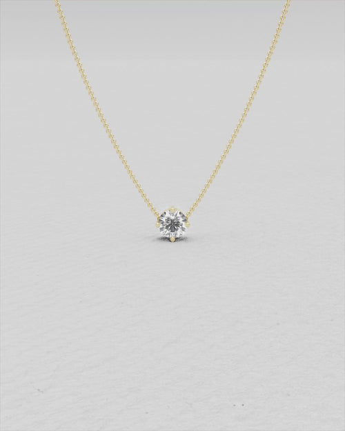White gold and diamond pendant